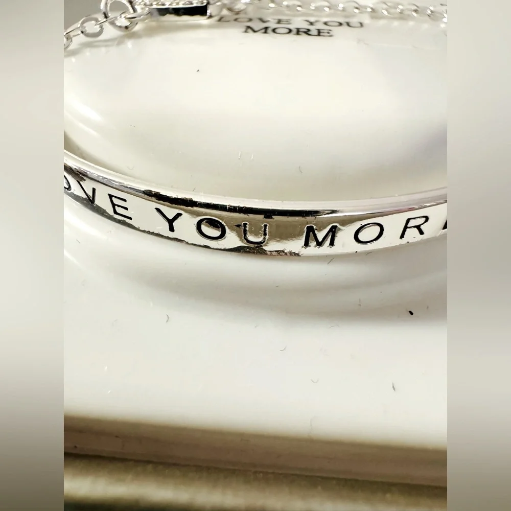 NWT silver plated bracelet w/attached charm, coach charm, & leather purse charm - Picture 5 of 16